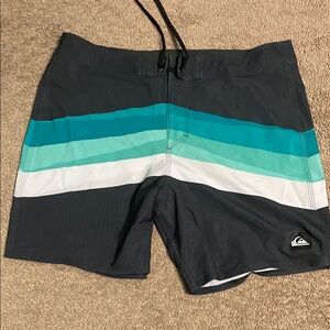 Quiksilver Black and Blue Board Shorts with Modern Stripes